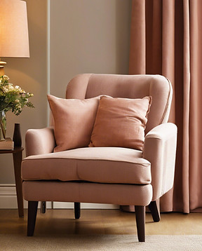 a picture of a chair matching curtains i