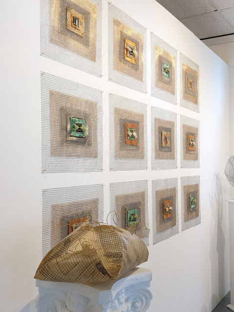 metal wire mesh of copper, brass, and stainless steel in layered architectural industrial style