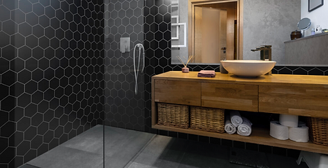 Wignall’s Kitchens – Bathrooms – Bedrooms -  Newton Abbot –Luxury wall panels from Fibo Respatex,, black hexagon tiles, bespoke wood vanity unit, surface mounted basin - B