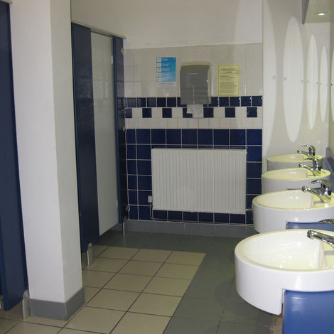 Wignall's Contract Joinery, Manufacture and Install washrooms, toilet cubicles, IPS and vanity tops to architects designs for commercial and public buildings – using postformed laminate or solid surface materials - for a police station