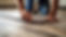 Wignall’s Kitchens – Bathrooms – Bedrooms - Newton Abbot – Flooring – laminate flooring being laid by skilled craftsmen - D