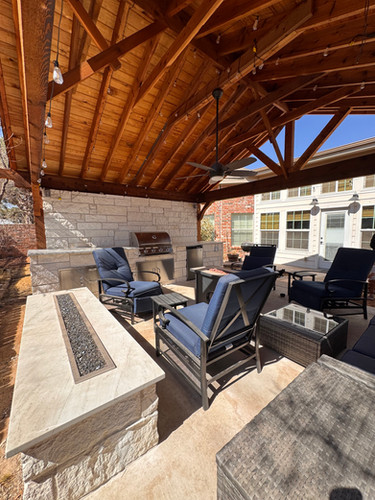 outdoor kitchen from fire pit view