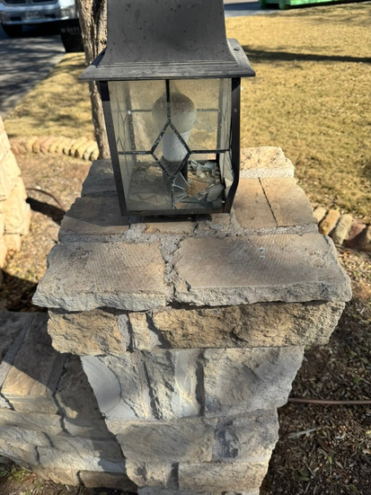 Entrance rock wall before photo