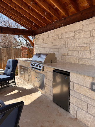 Grill and rock wall