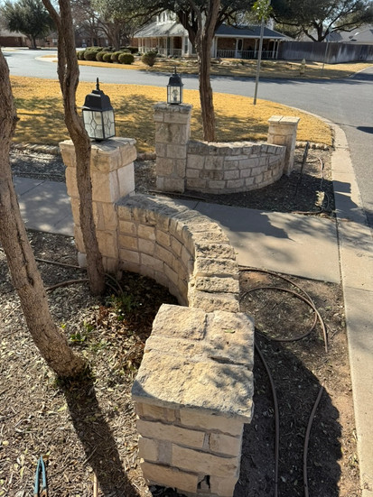 Entrance rock wall before photo