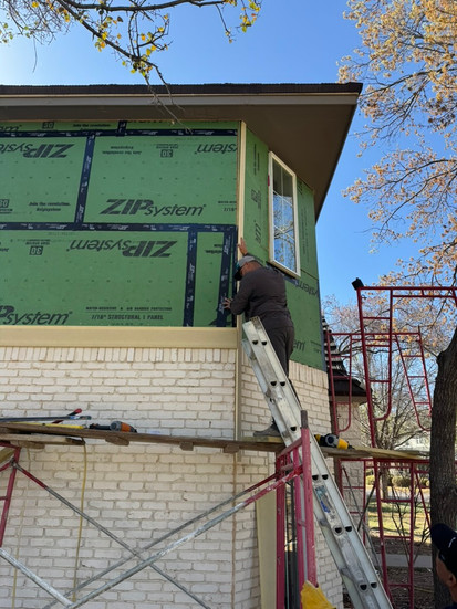Adding Zip System sheathing before installing new siding
