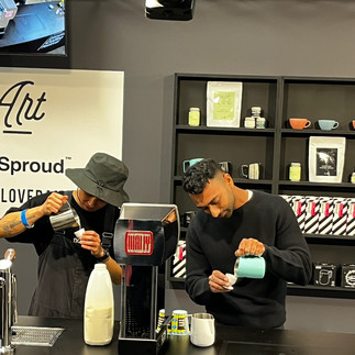 The two men pouring latte art into small egg cups