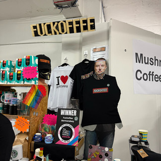 Collection of stickers and products at an expo booth