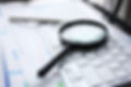 magnifying-glass-lies-white-keyboard-989889_5760-3840-0-0.jpeg