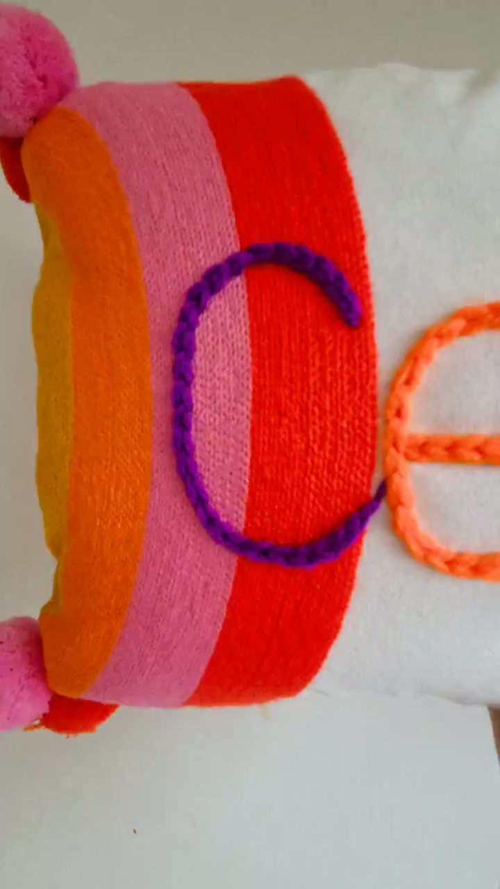 Thumbnail: Personalised Rainbow Name Cushion Hand Embroidered Kids Cushion | Nursery Decor