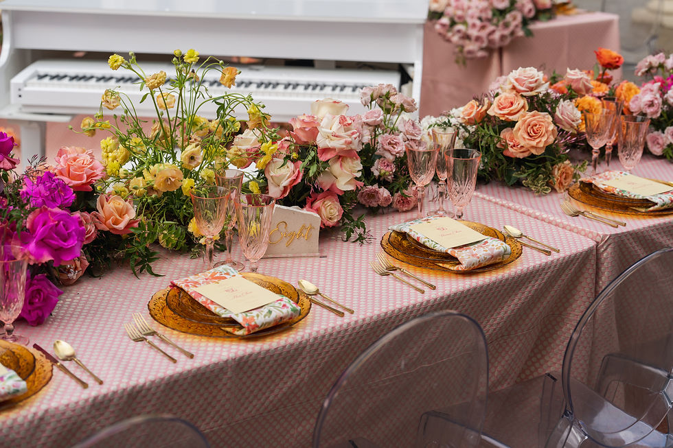 Luxury wedding reception decor at Knotting Hill Place featuring elegant tablescapes, candles, and romantic floral centerpieces.