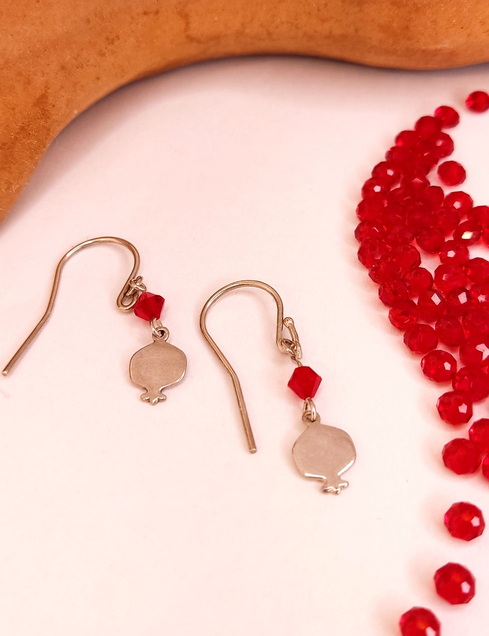 Thumbnail: A short and delicate pomegranate and crystal earring