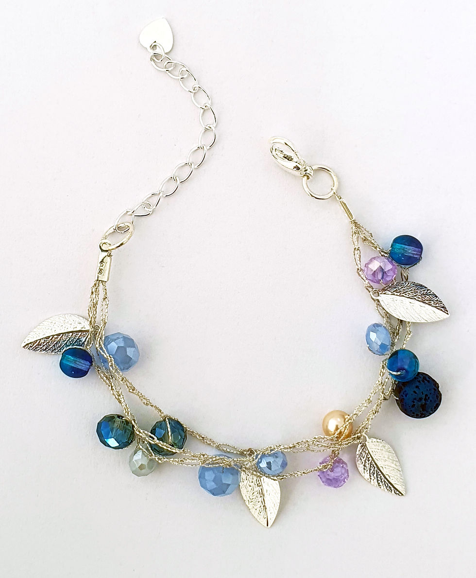 Thumbnail: Handmade silk bracelet with silver leaves and crystals