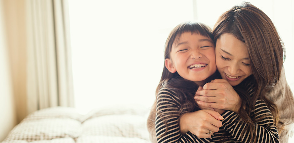 Mother and Daughter Hugging