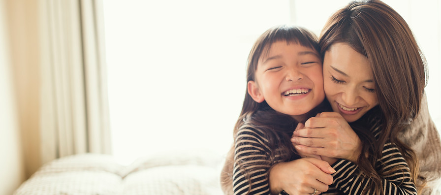 Mother and Daughter Hugging