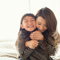 Mother and Daughter Hugging