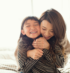 Mother and Daughter Hugging