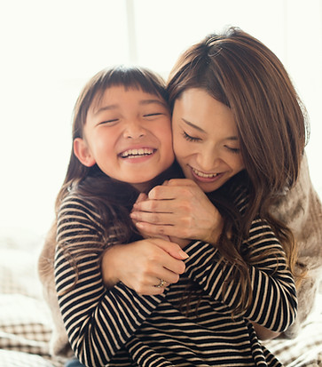 Mother and Daughter Hugging