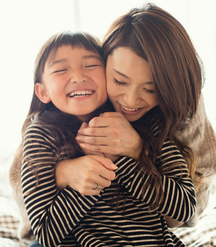 Mother and Daughter Hugging
