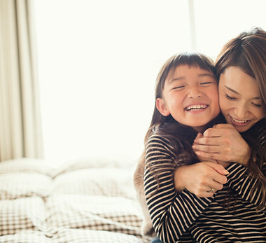 Mother and Daughter Hugging