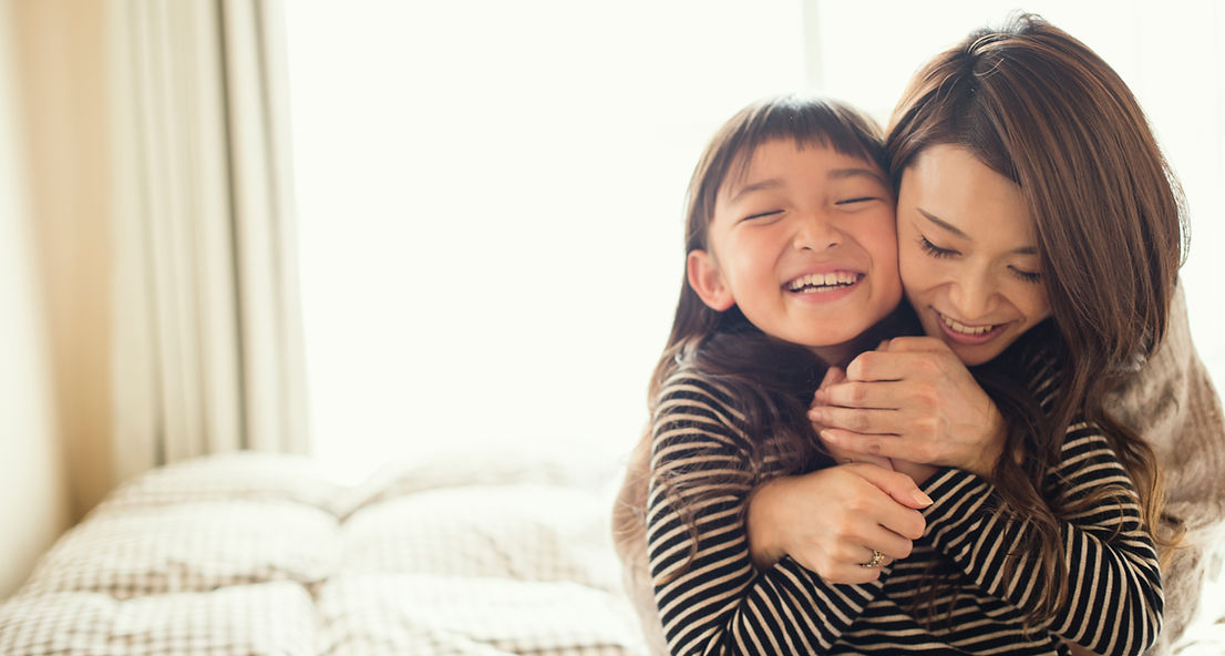 Mother and Daughter Hugging