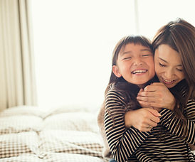 Mother and Daughter Hugging