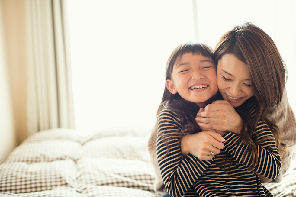 Mother Hugging Daughter