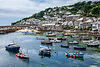 view-of-fishing-boats-and-harbor-mousehole-cornw-2025-04-04-06-44-01-utc.jpg