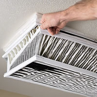 changing a hepa home ventilation filter.jpg
