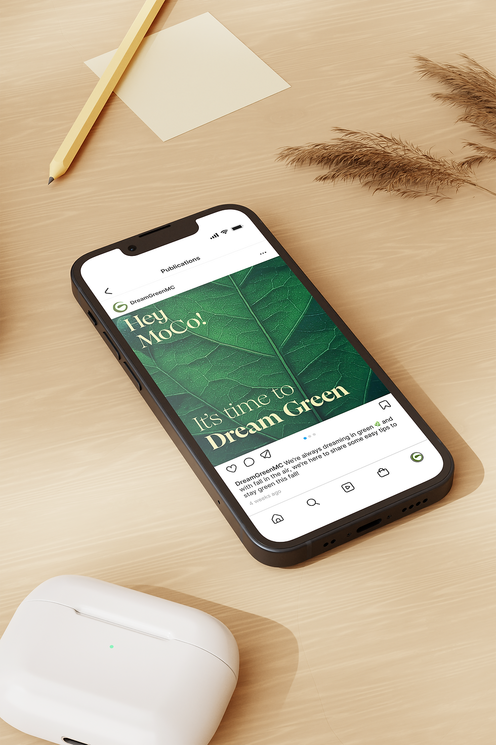 A phone with an Instagram carousel being depicted. The screen shows the same dark green leaf and yellow writing that says "Hey MoCo! It's time to Dream Green."