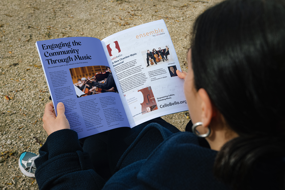A woman is reading Strings magazine. The right hand side features an ad that we designed for CelloBello that takes up the full page.