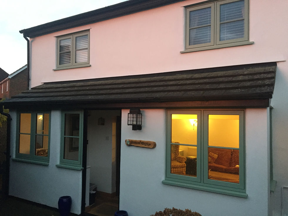 Flush windows in chartwell green finish