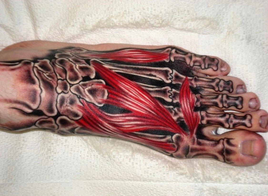 foot tattoo lions den tattoo.jpg