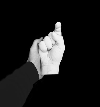Hand Holding Artificial Hand