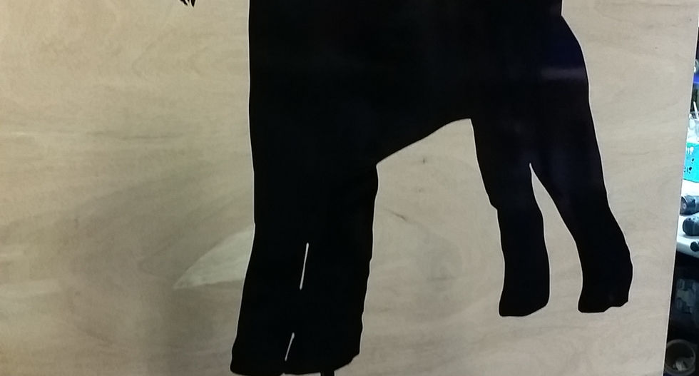 Laser cut scottish terrier silhouette signage painted black.