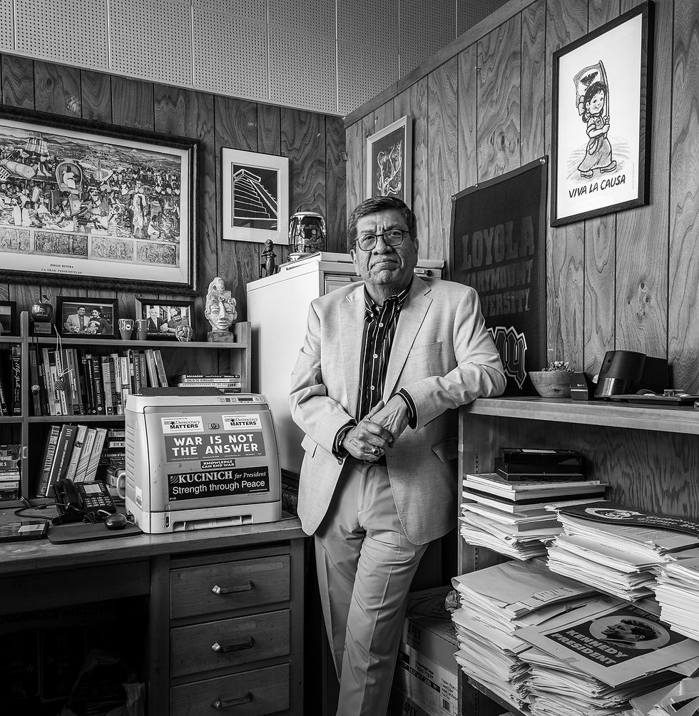 Professor Pete Lopez standing proud in his office in the foreign language building. (Anita Boli for the Valley Star)