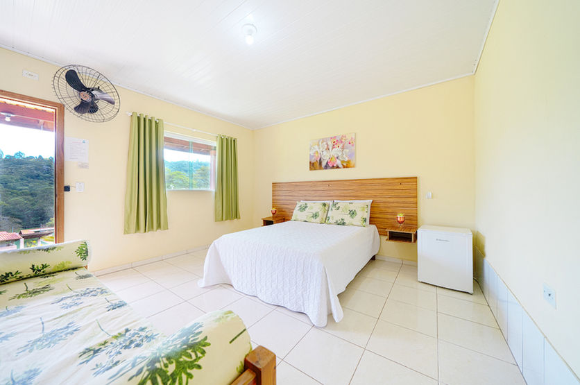 quartos confortaveis do Recanto Julubi Atibaia, hotel no interior de Sao Paulo com area verde gigante e lazer para toda a familia