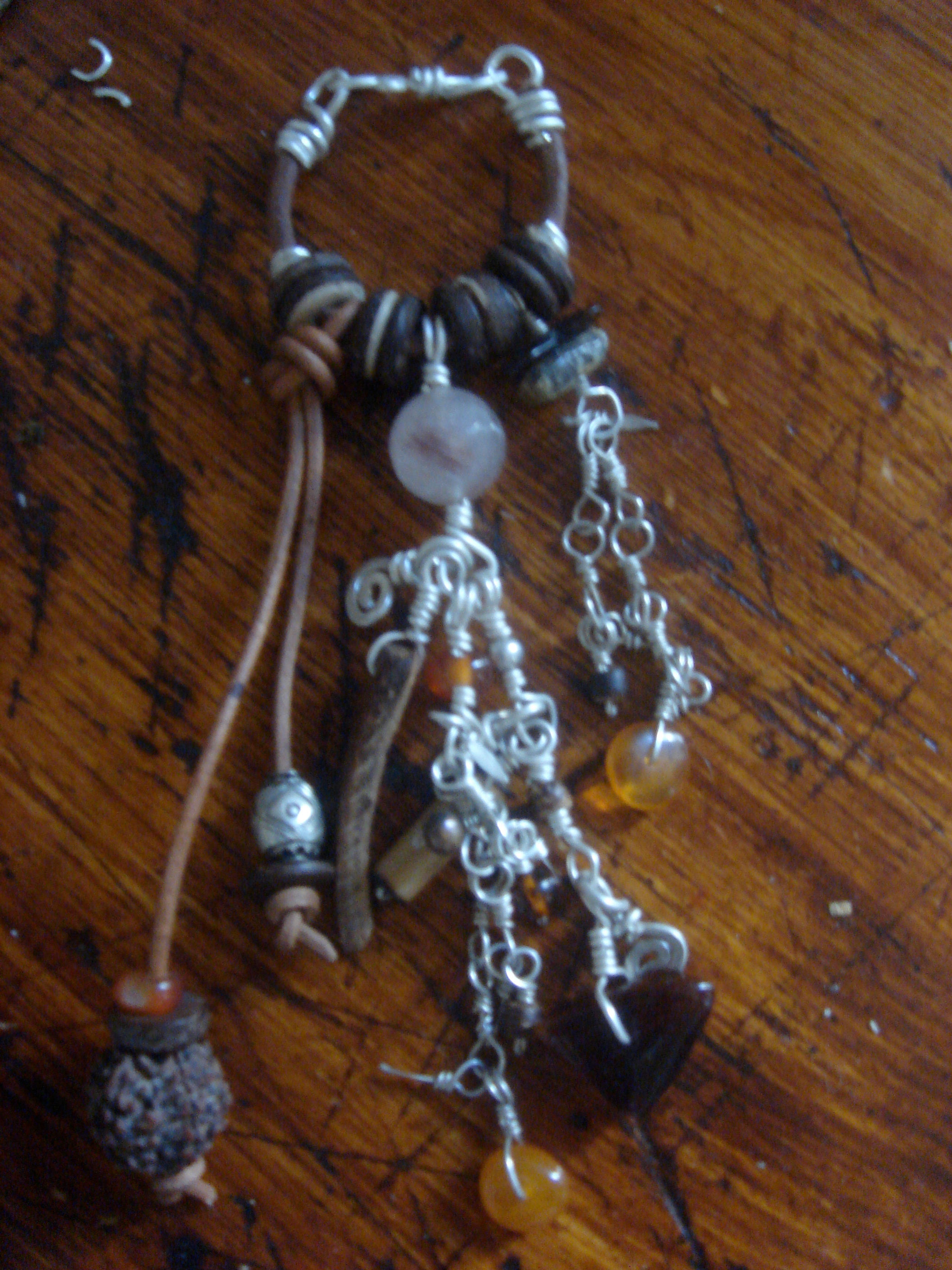 Bijoux de Sac Quartz Rutile Ambre Bambou Argent Cuir Noix de Coco