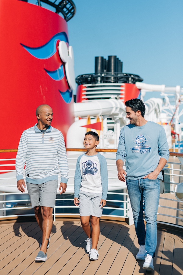 Family wearing Disney Wish merchandise