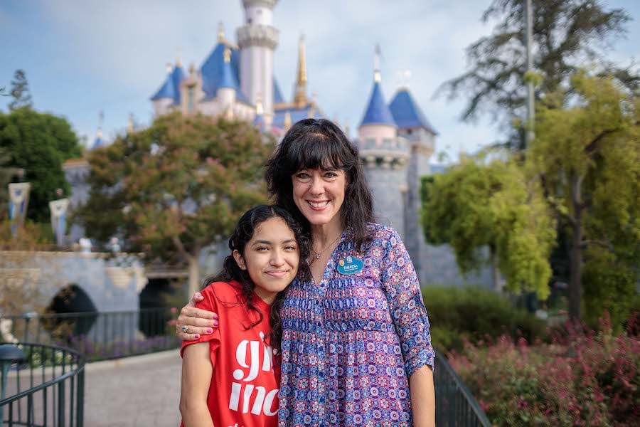 Theresa Anderson stands along side her Girls Inc. mentee, April