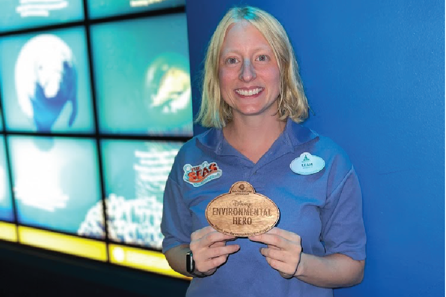 Cast Member Leah with Disney Environmental Hero award