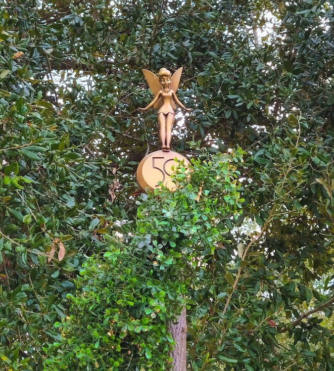 Tinker Bell's "Disney Fab 50 Character Collection" statue at Magic Kingdom Park