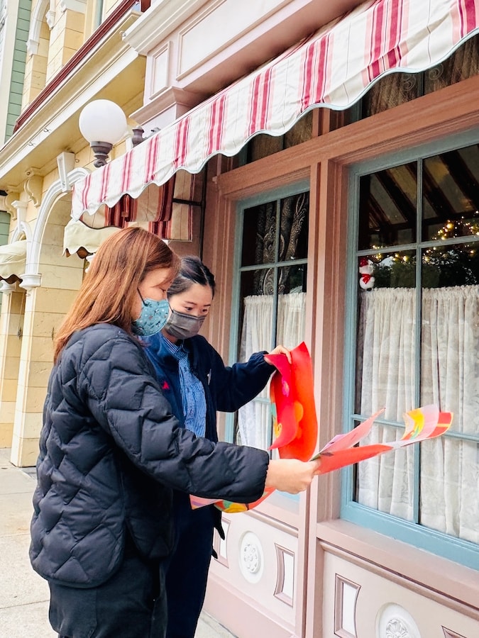 Cast members preparing for Hong Kong Disneyland’s Lunar New Year 2023