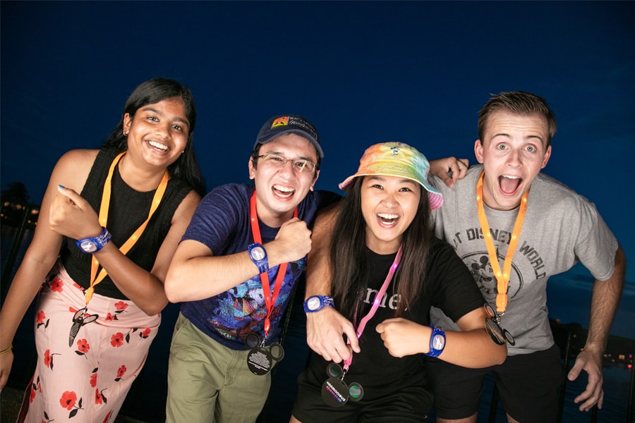 Four Cast Members with MagicBand+