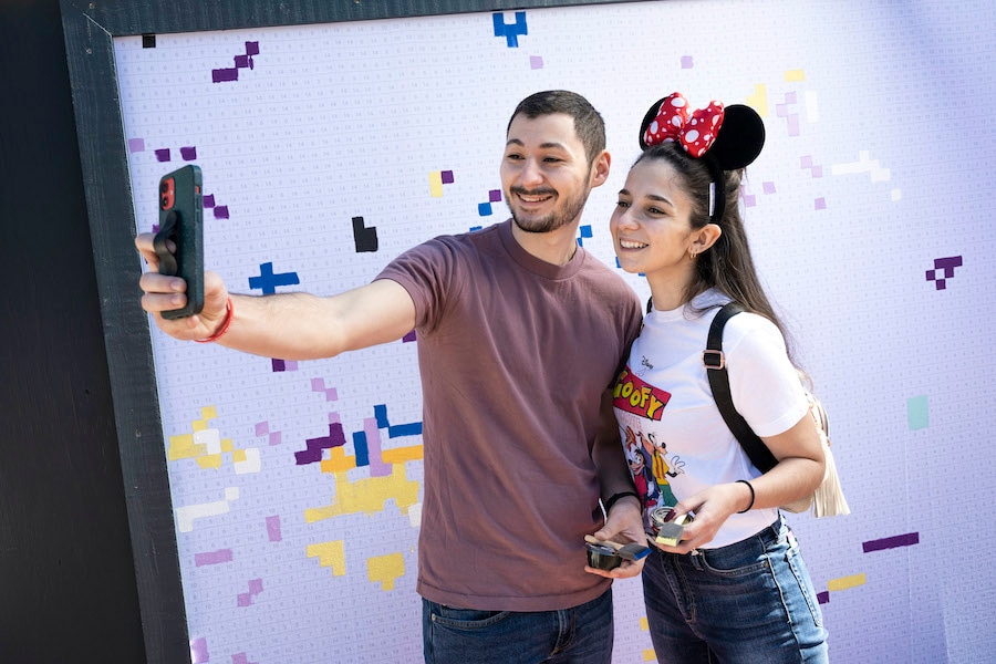 Guests at the Expression Section: A Paint by Number Mural during the EPCOT International Festival of the Arts 