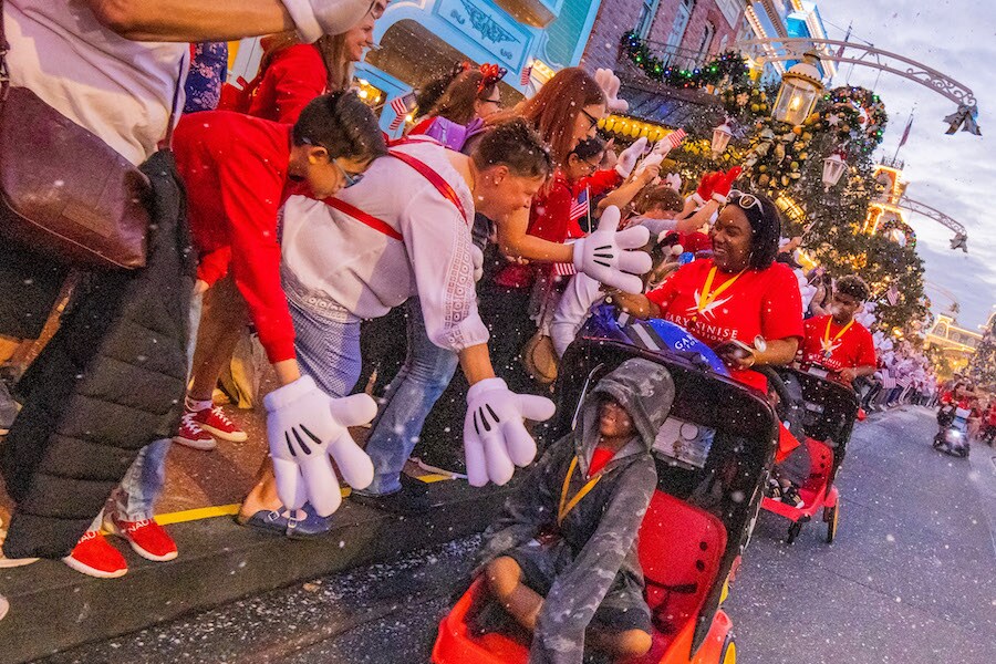 Families and Disney VoluntEARS – along Main Street, U.S.A.