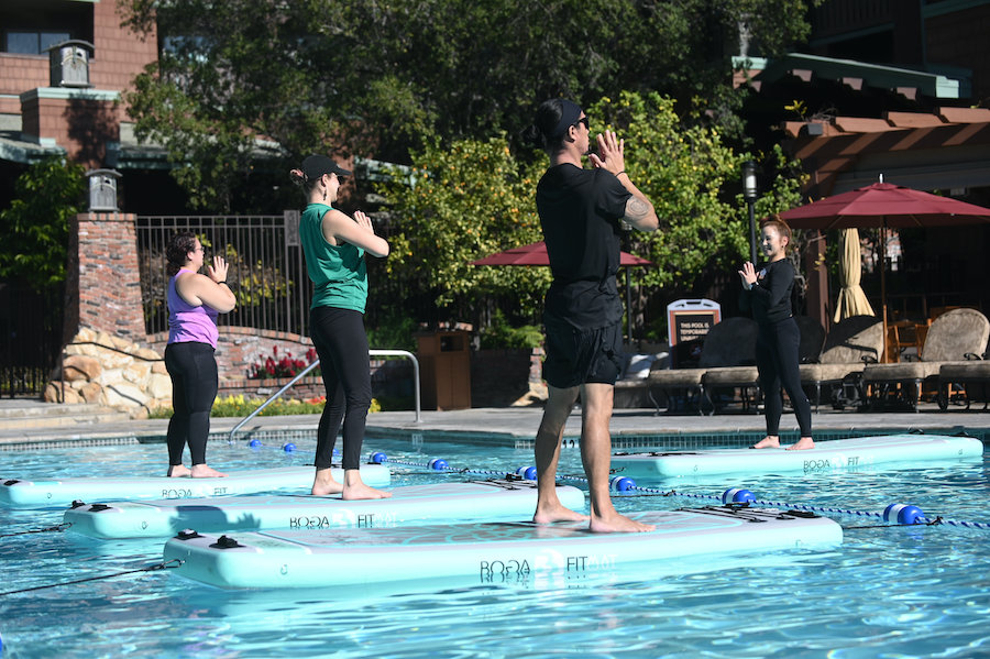 Guests doing Aqua Yoga at Disney's Grand Californian Resort & Spa