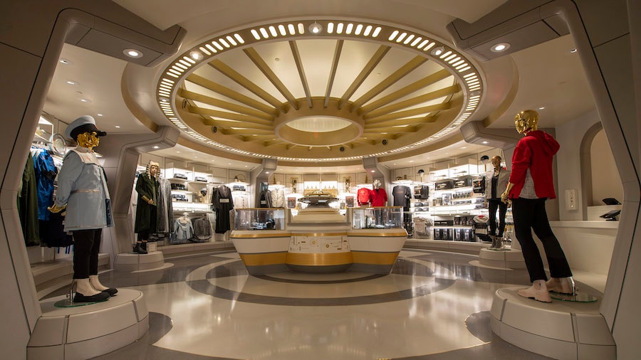 The Chandrila Collection is a boutique off the Atrium of the Halcyon starcruiser where passengers can dress in galactic fashion as part of their stay at Star Wars: Galactic Starcruiser at Walt Disney World Resort