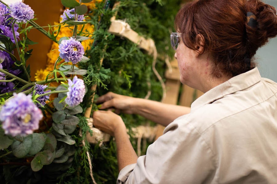 Cast member building a Silleta for the Downtown Disney District
