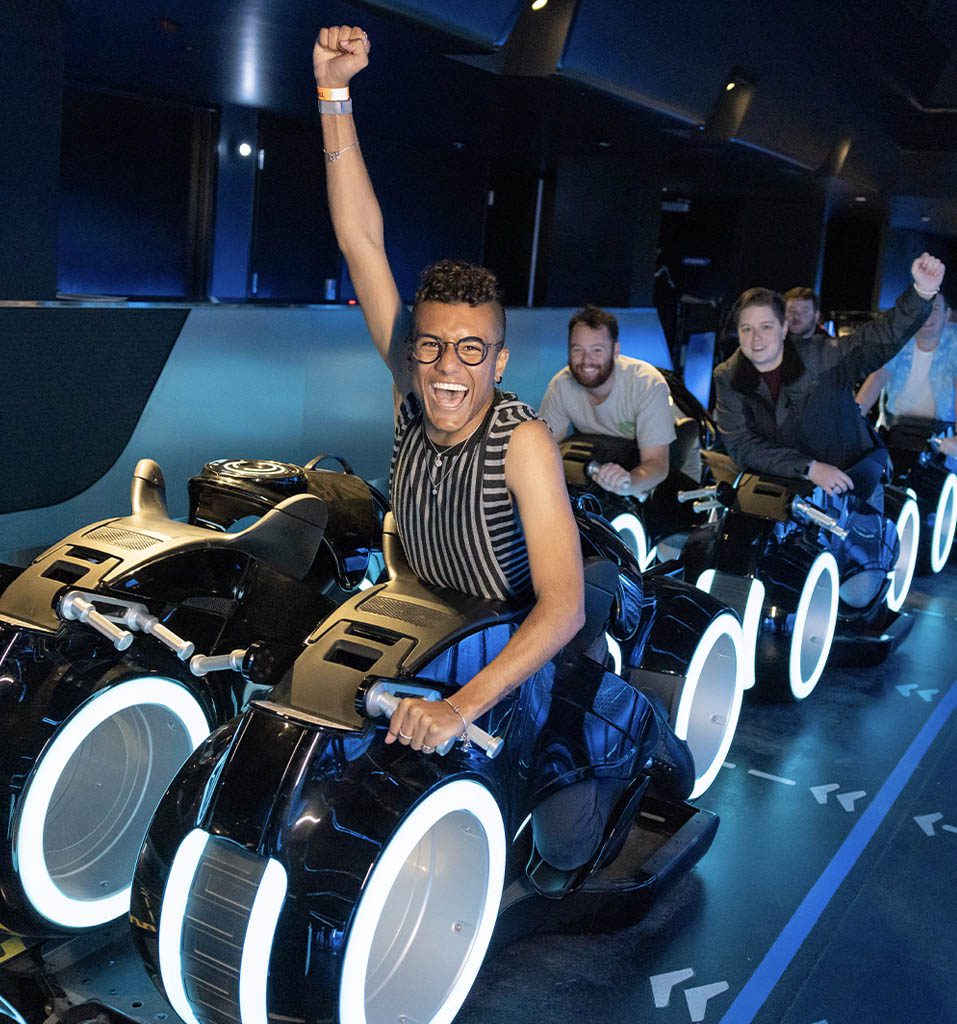 Cast members cheer aboard TRON